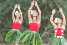 women dance the hula