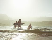 Hanalei Bay surfers
