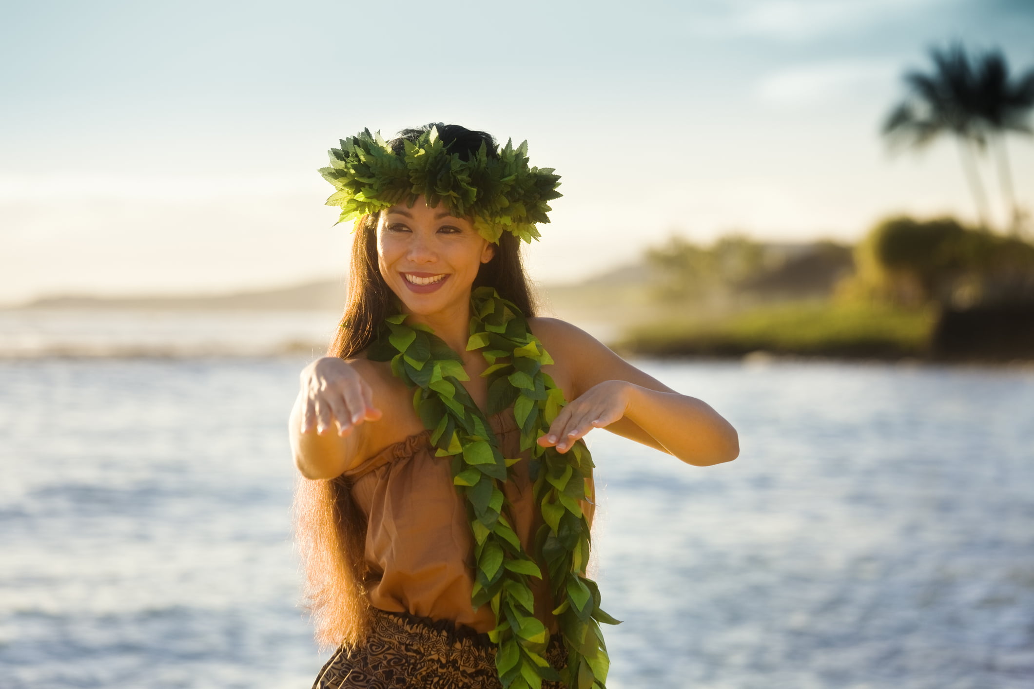 hawaiian dancer with green leaf lei