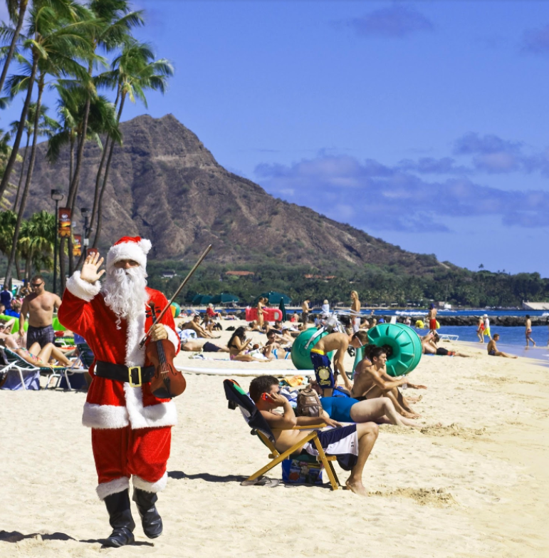 hawaiian santa in canoe